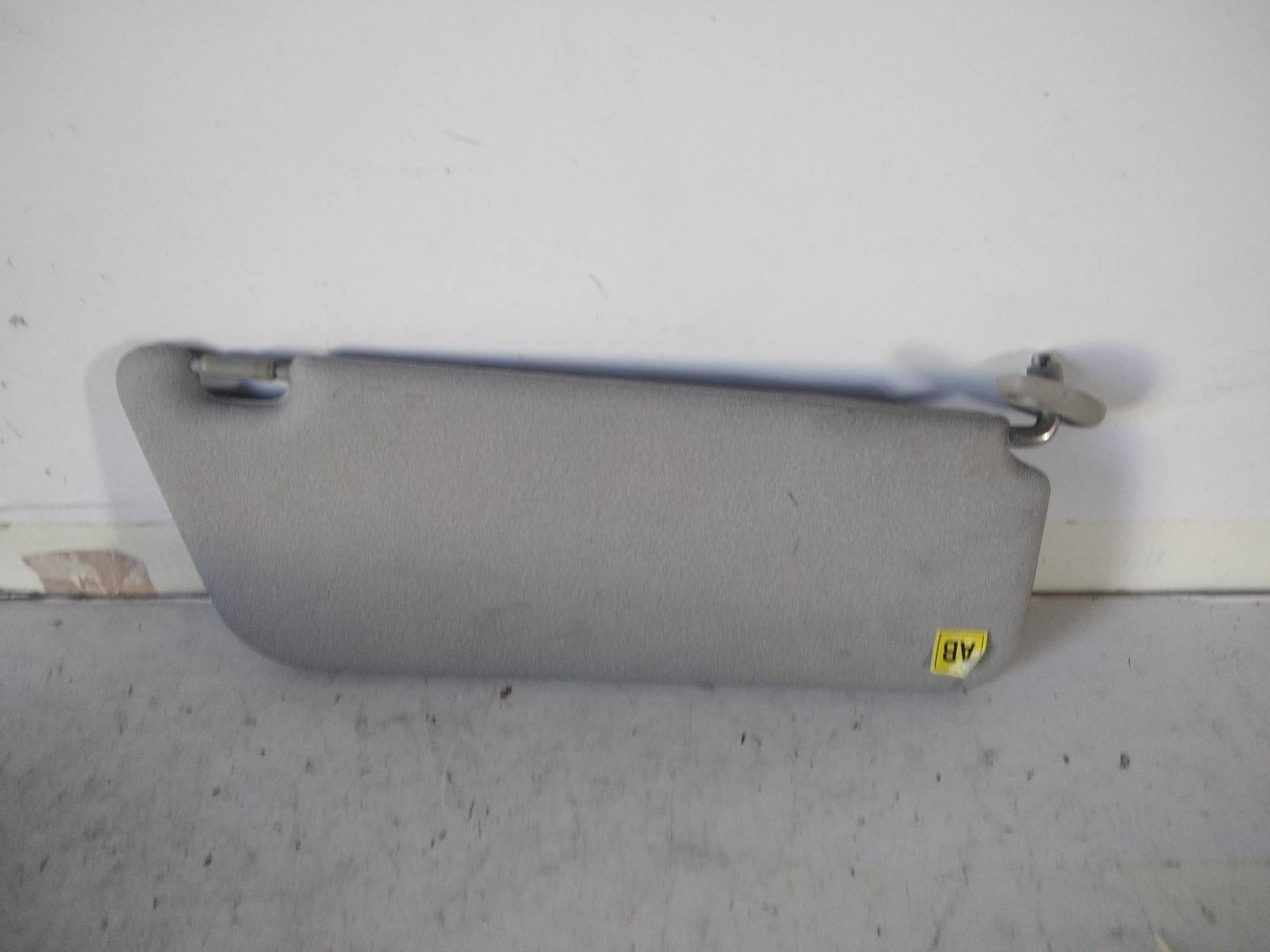 Aletta parasole parabrezza sx.